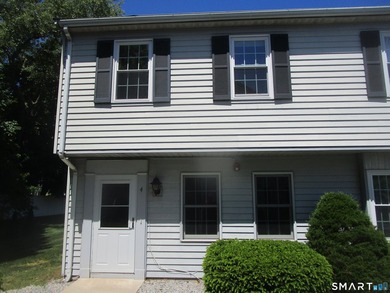 Enjoy carefree living in this well-maintained and updated - photo 1