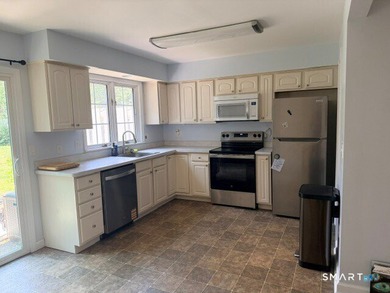 Enjoy carefree living in this well-maintained and updated - photo 3