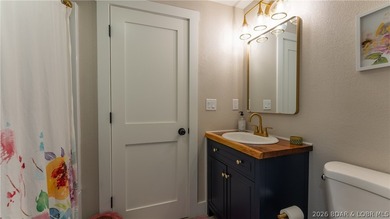 This rare lakefront villa-esque condo is one of only 2 units in - photo 25