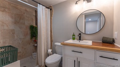 This rare lakefront villa-esque condo is one of only 2 units in - photo 33