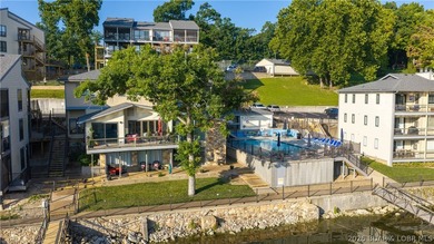 This rare lakefront villa-esque condo is one of only 2 units in - photo 44