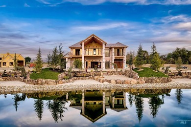 Set on its own private waterfront within the highly sought-after - photo 1