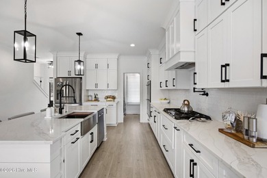 Welcome to luxurious coastal living in this beautifully crafted - photo 12