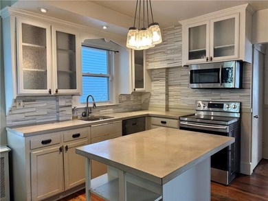 A true diamond in the rough, this classic Newport Dutch Colonial - photo 12