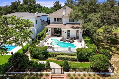 SIMPLY STUNNING!! Perched on the edge of our glistening - photo 1