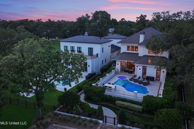 SIMPLY STUNNING!! Perched on the edge of our glistening - photo 2