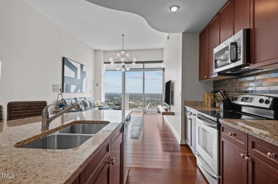 Step into luxury living with this exceptional penthouse level /