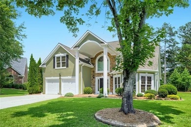 Welcome Home to this Executive home beautifully situated on the - photo 2