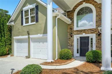 Welcome Home to this Executive home beautifully situated on the - photo 3