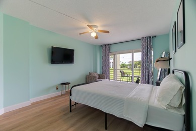 Welcome to this spacious 2-bedroom, 2-bath condominium located - photo 13