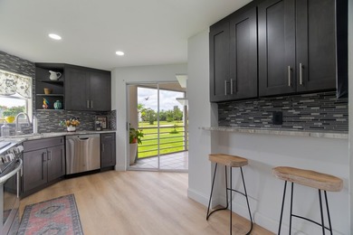 Welcome to this spacious 2-bedroom, 2-bath condominium located - photo 19