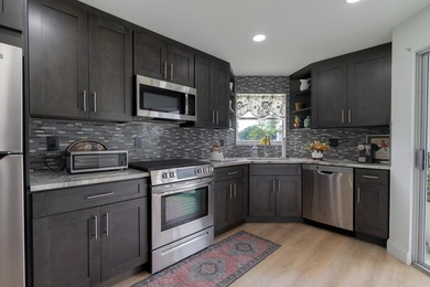 Welcome to this spacious 2-bedroom, 2-bath condominium located - photo 20