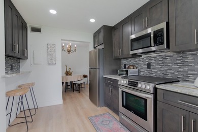 Welcome to this spacious 2-bedroom, 2-bath condominium located - photo 21