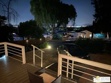 This lake view 3-bedroom, 2-bath home sits on a generous 50' x - photo 23