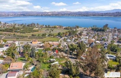 This lake view 3-bedroom, 2-bath home sits on a generous 50' x - photo 28