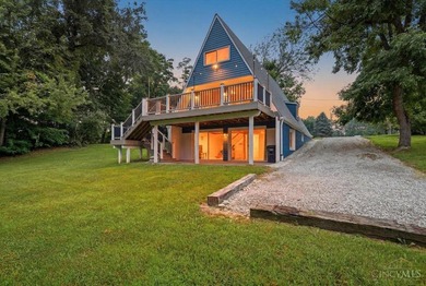 Welcome to 1203 Harz Cove at Lake Lorelei! This fully renovated - photo 2
