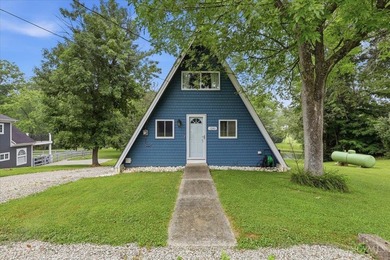 Welcome to 1203 Harz Cove at Lake Lorelei! This fully renovated - photo 3