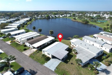 Lake Home For Sale in Micco, Florida