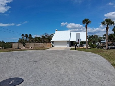 This must-see, one-of-a-kind waterfront pool home tastefully - photo 3