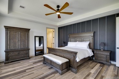 Discover this exceptional Hill Country luxury home situated on 5