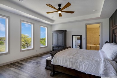 Discover this exceptional Hill Country luxury home situated on 5