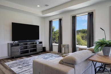 Discover this exceptional Hill Country luxury home situated on 5