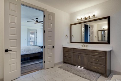 Discover this exceptional Hill Country luxury home situated on 5