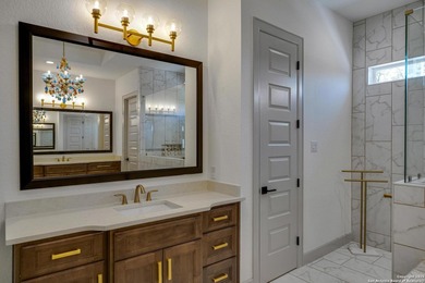 Discover this exceptional Hill Country luxury home situated on 5