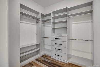 Discover this exceptional Hill Country luxury home situated on 5