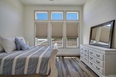 Discover this exceptional Hill Country luxury home situated on 5