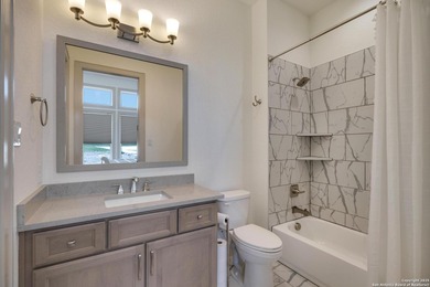 Discover this exceptional Hill Country luxury home situated on 5