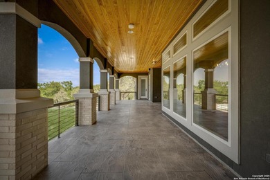 Discover this exceptional Hill Country luxury home situated on 5