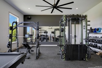 Discover this exceptional Hill Country luxury home situated on 5