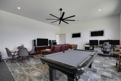 Discover this exceptional Hill Country luxury home situated on 5