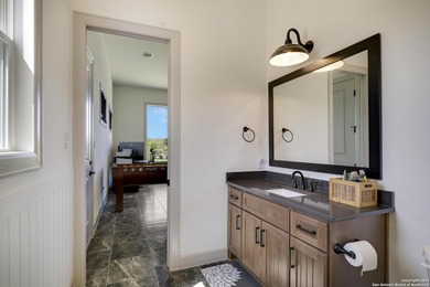 Discover this exceptional Hill Country luxury home situated on 5