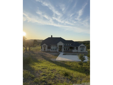 Discover this exceptional Hill Country luxury home situated on 5
