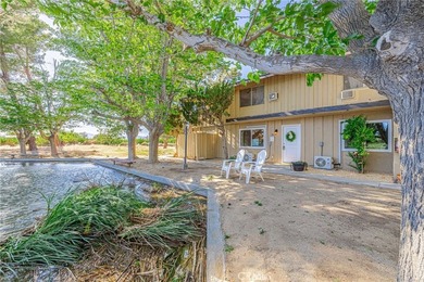 Wake up to tranquil waterfront views in this beautifully updated - photo 4