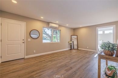 Wake up to tranquil waterfront views in this beautifully updated - photo 8