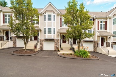 This 3 story townhouse is located in the Kensington Woods - photo 1