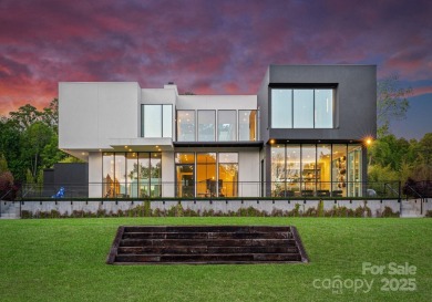 Situated on over 1.75 acres in SouthPark's sought after Carmel