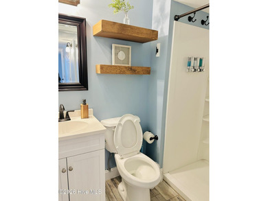 Experience oceanfront living in this beautifully appointed