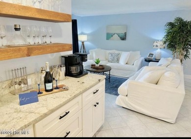 Experience oceanfront living in this beautifully appointed