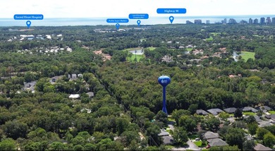 Beautiful lot close to Mack Bayou - minutes from Sacred Heart - photo 1