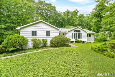 Introducing an exceptional ranch-style retreat nestled on a - photo 3