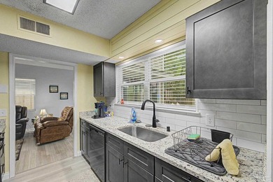 Welcome home to this beautifully remodeled 3-bedroom, 2-bath - photo 8