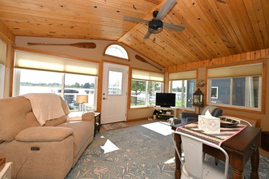Immerse yourself in the beauty of lakefront living with this - photo 12