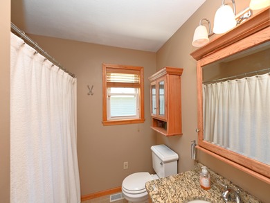 Immerse yourself in the beauty of lakefront living with this - photo 20