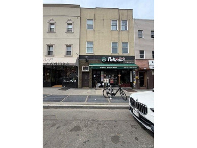 Located in a vibrant commercial corridor, 941 Manhattan Avenue - photo 1