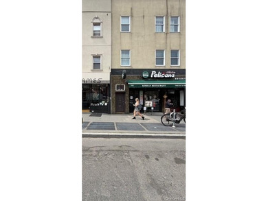 Located in a vibrant commercial corridor, 941 Manhattan Avenue - photo 2