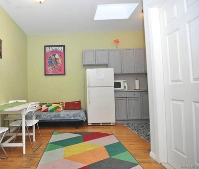 Located in a vibrant commercial corridor, 941 Manhattan Avenue - photo 10